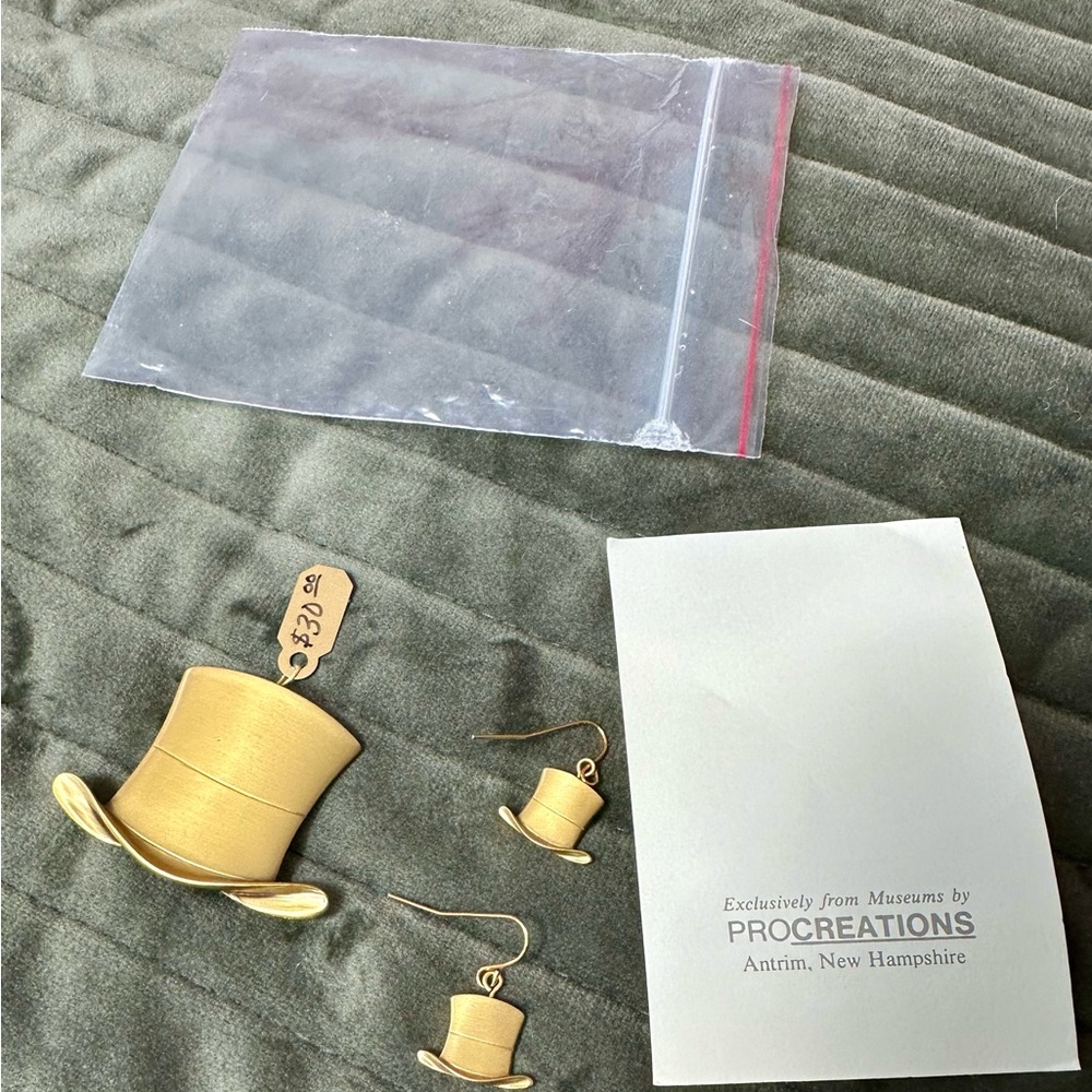 Cute top hat and earrings set NEW in original packaging.